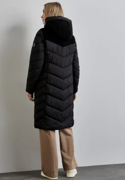 Veste à structure mixte