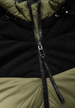 Veste à structure mixte